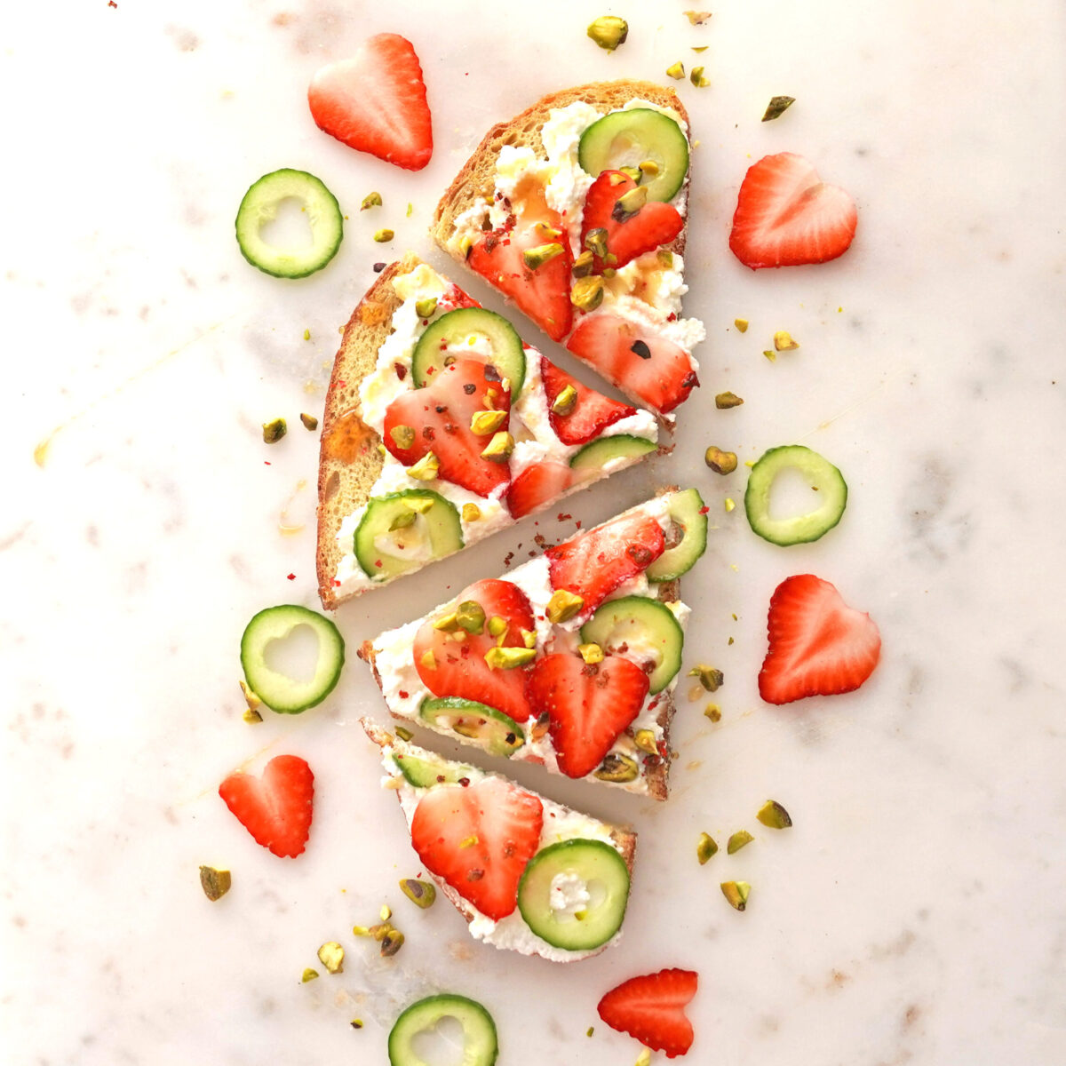 strawberry ricotta toast with pistachios and honey