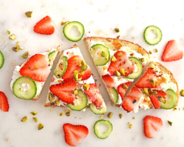 strawberry ricotta toast with pistachios and honey