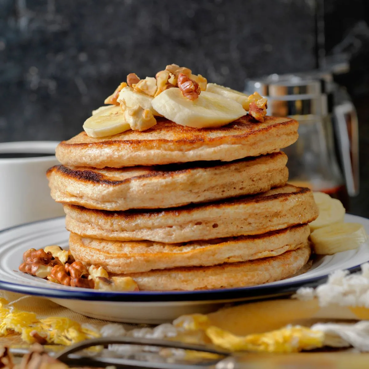 30 mouthwatering pancake recipes - stack of pancakes with bananas