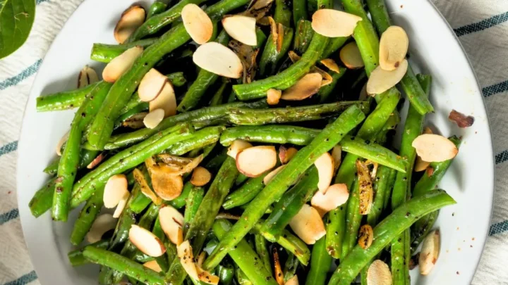 bowl of green beans with slivered almonds - gluten free sides for bbq