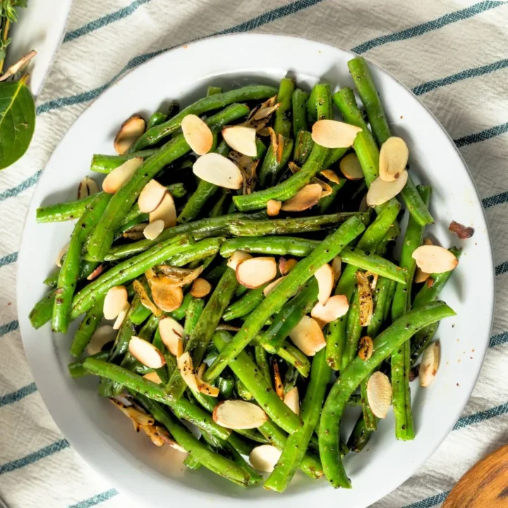 bowl of green beans with slivered almonds - gluten free sides for bbq