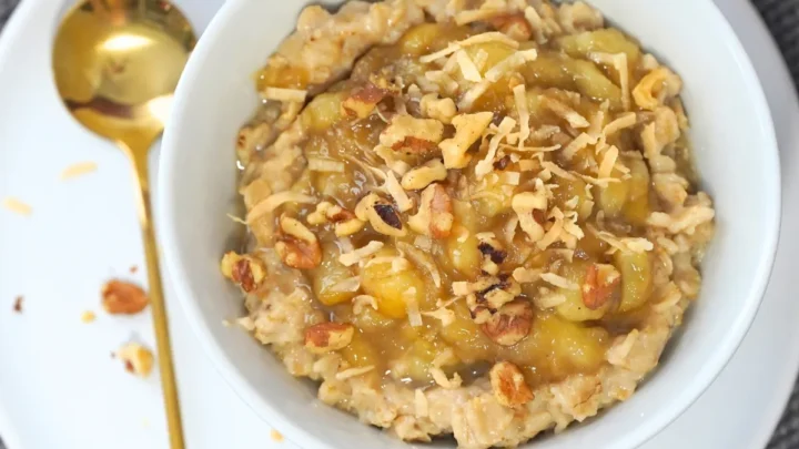 banana's foster oatmeal in a white bowl