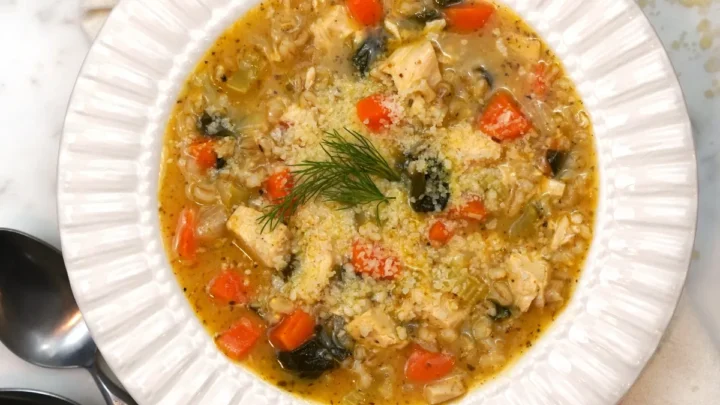 lemon chicken soup in a white bowl