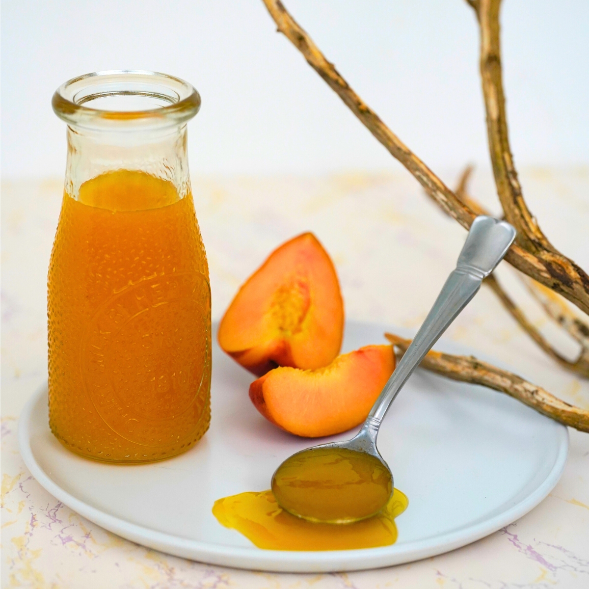 Bourbon Peach Glaze in a glass container