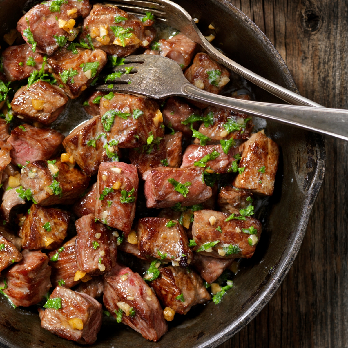 garlic butter steak bites in a pan