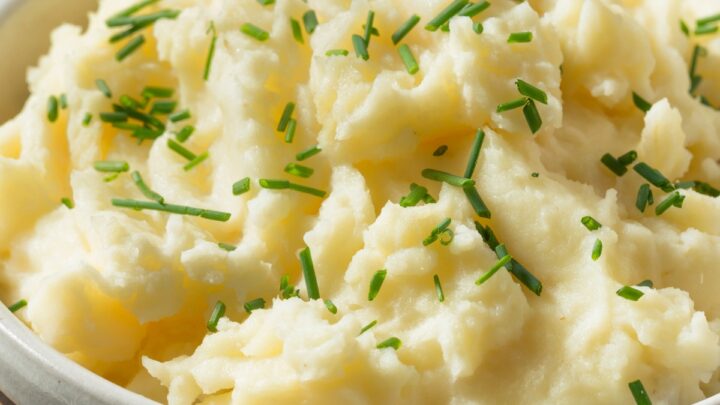 horseradish mashed potatoes in a white bowl on a table