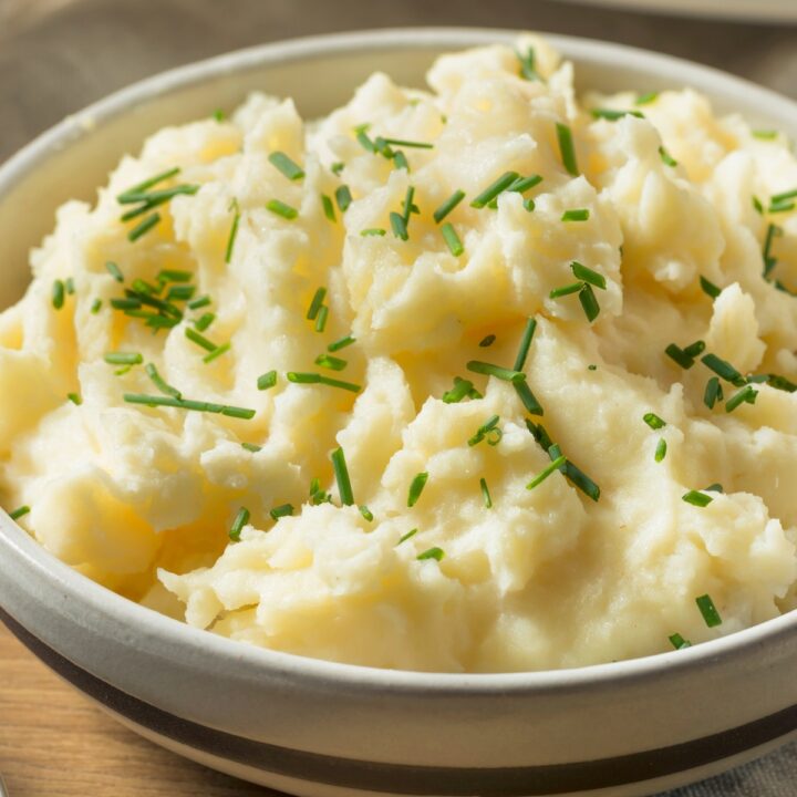 horseradish mashed potatoes in a white bowl on a table