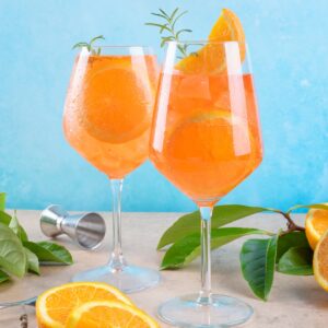 two wine glasses filled with orangecello spritz recipe