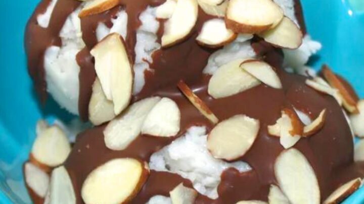 almond joy ice cream - a bowl of ice cream with chocolate and almonds