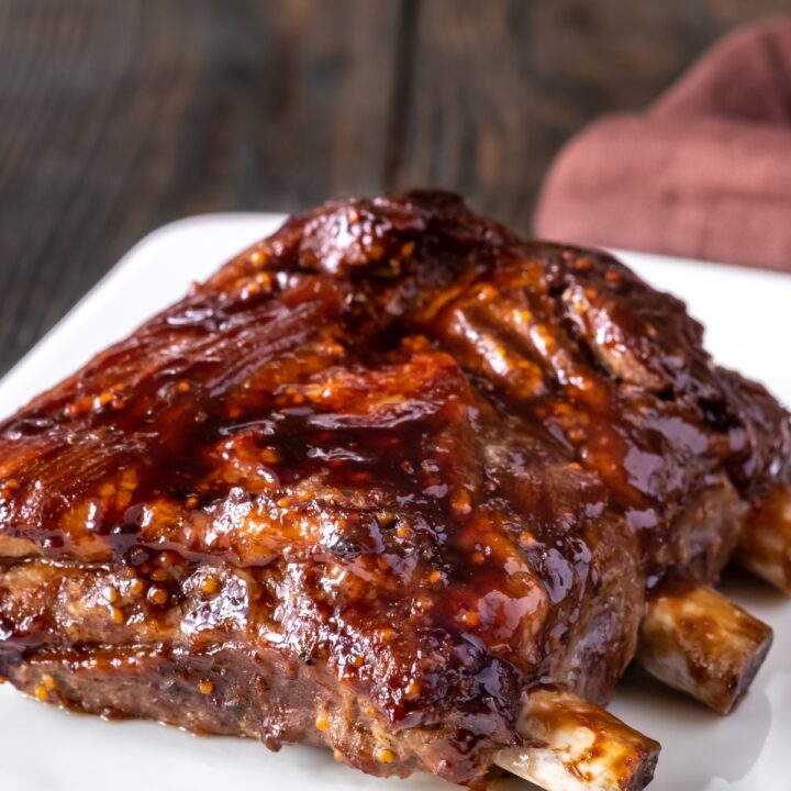 BBQ oven ribs on a white plate