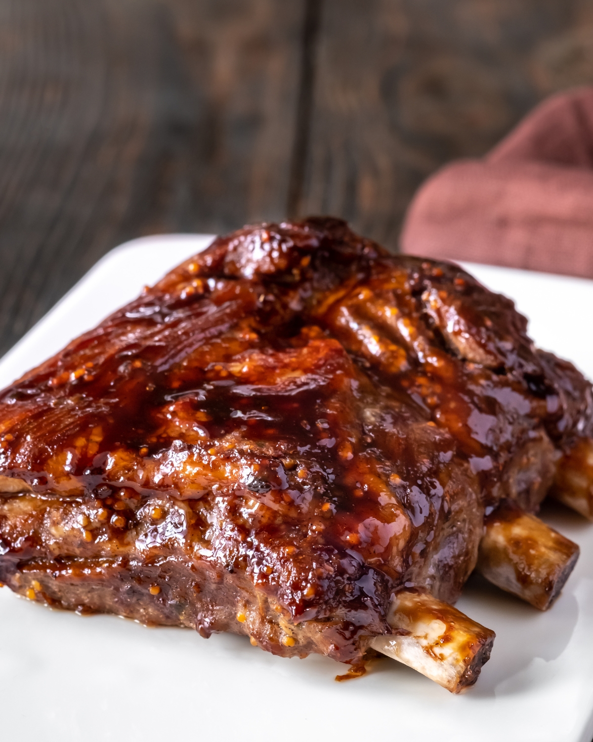 BBQ oven ribs on a white plate