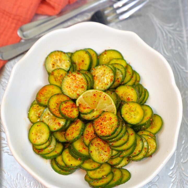 Tajin Cucumber salad in a white bowl