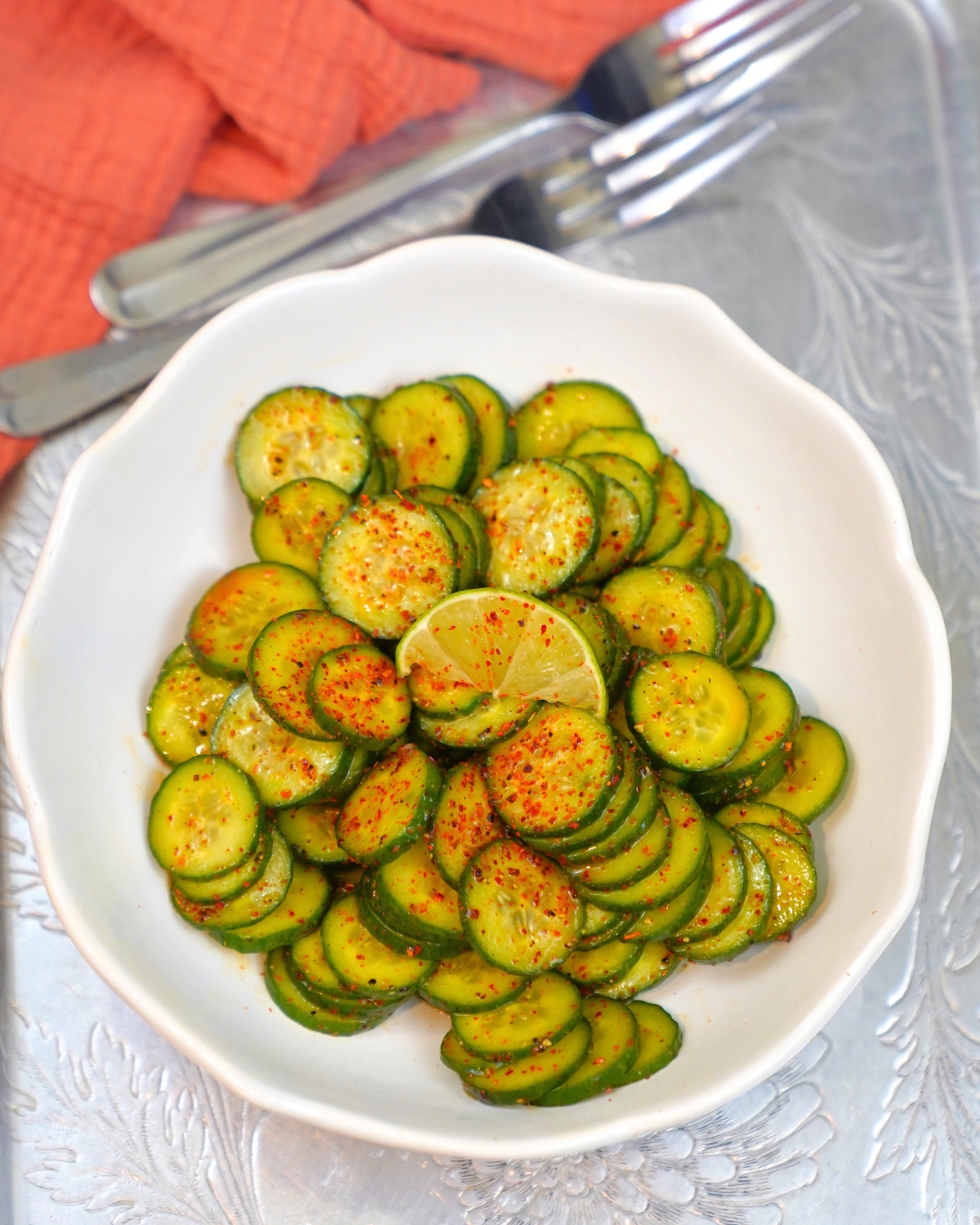 Tajin Cucumber salad in a white bowl