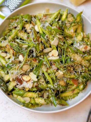Refreshing Raw Asparagus Salad Recipe in a white bowl