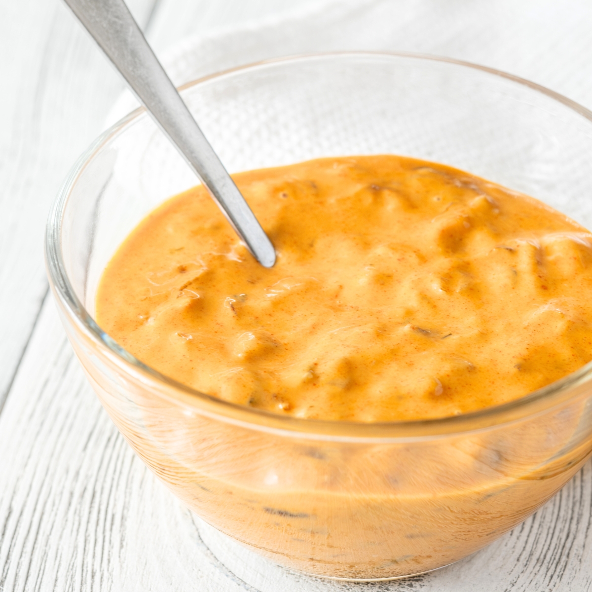 burger sauce in a white bowl with a spoon