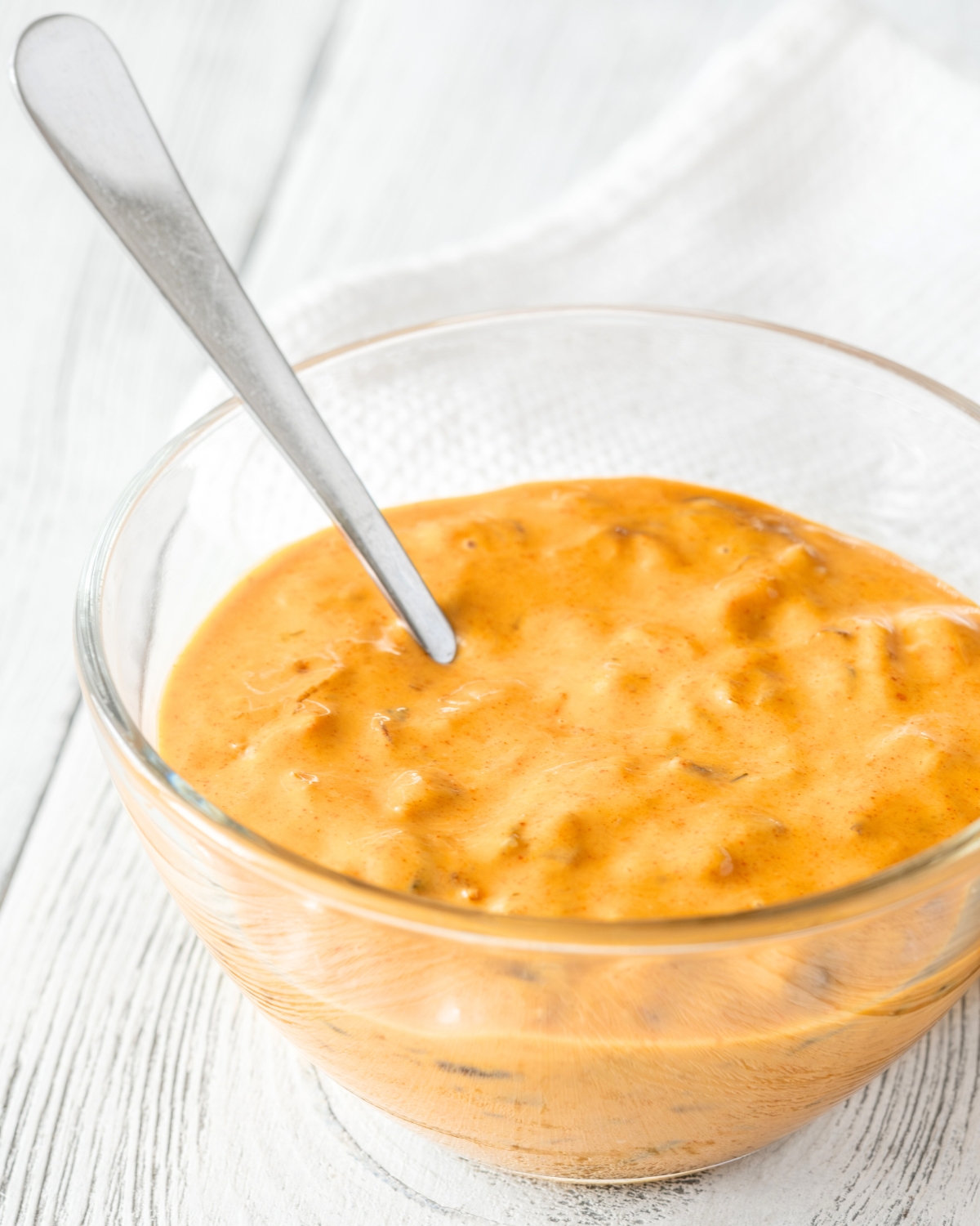 burger sauce in a white bowl with a spoon