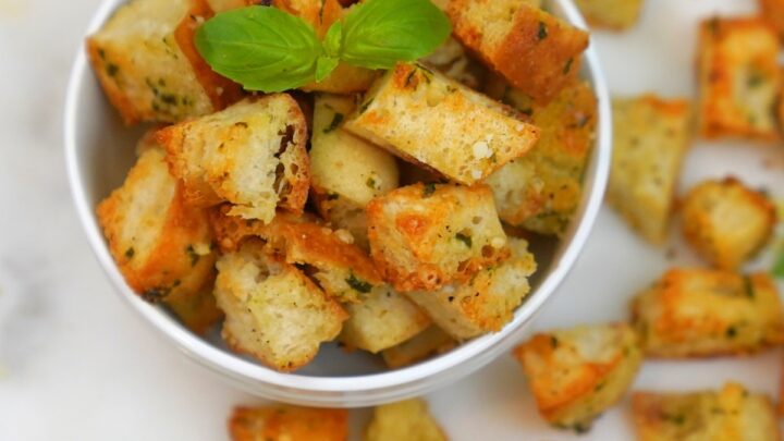 Parmesan Basil Croutons in a white bowl