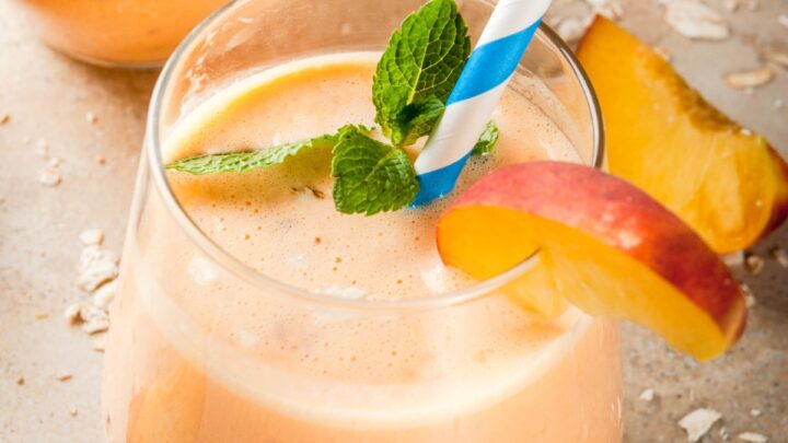 fresh peach smoothie in a glass