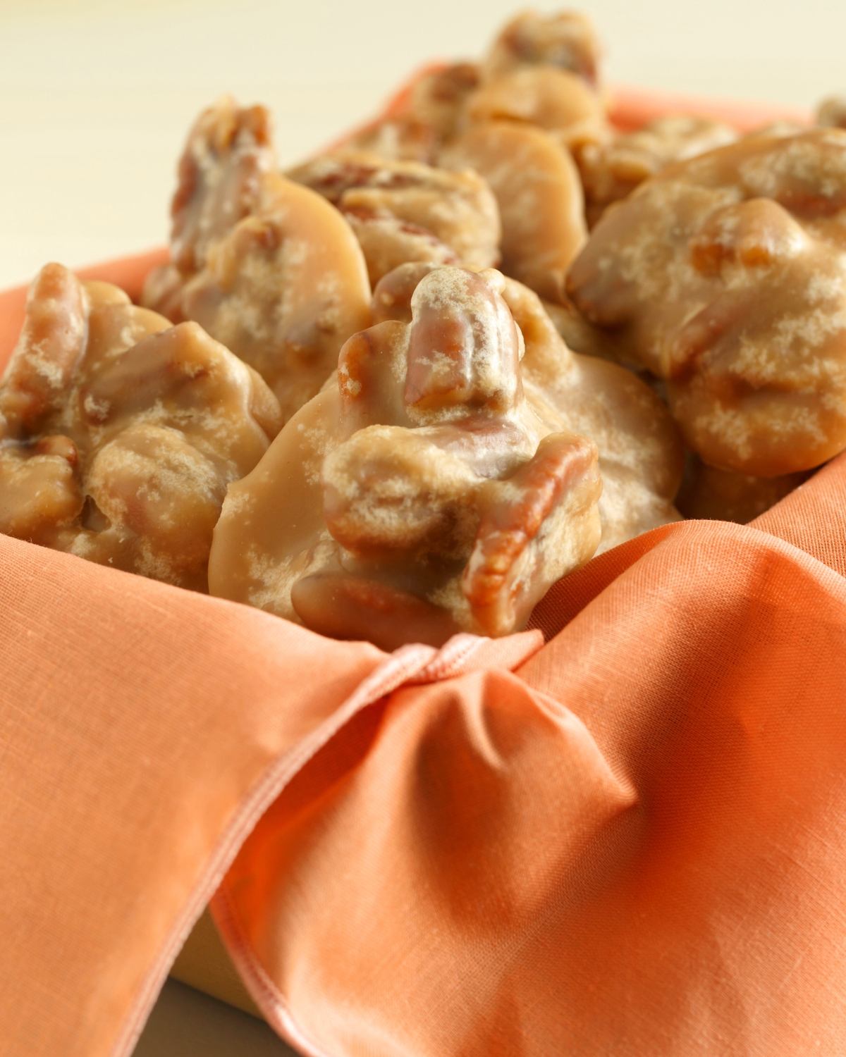 southern pecan pralines in an orange box