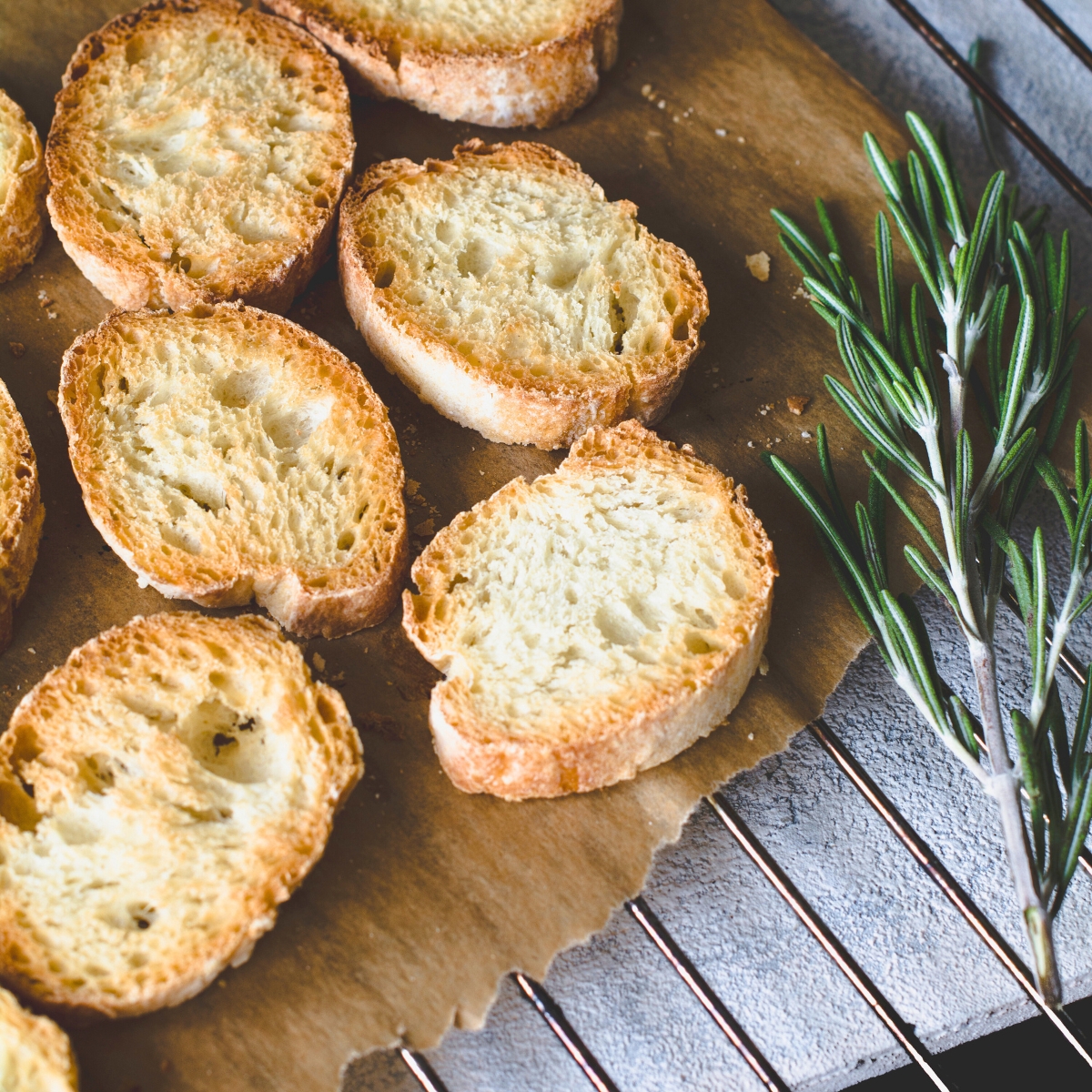 plain crostini on a wooden board