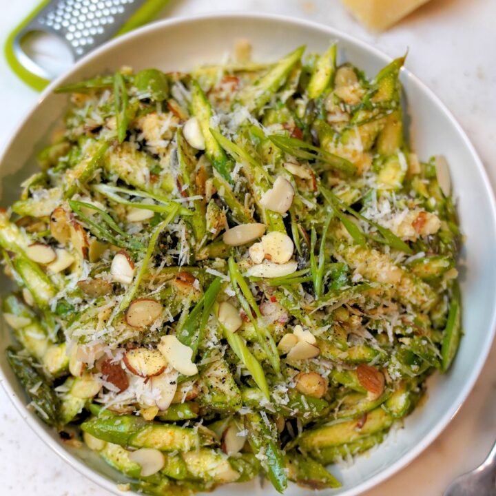 Refreshing Raw Asparagus Salad Recipe in a white bowl