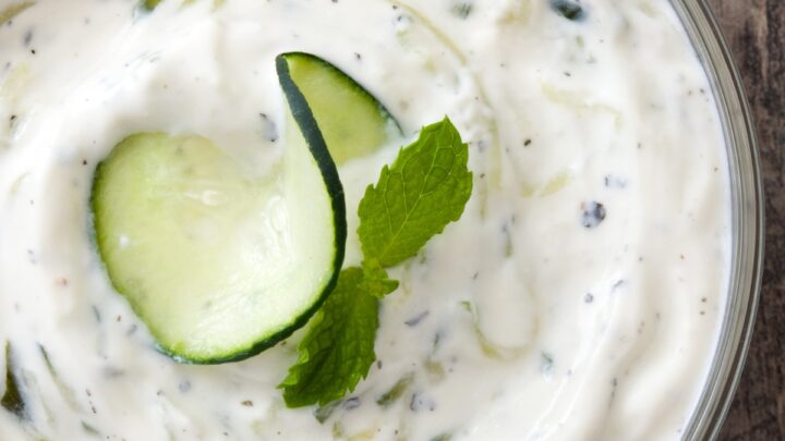 Tzatziki sauce on a white bowl