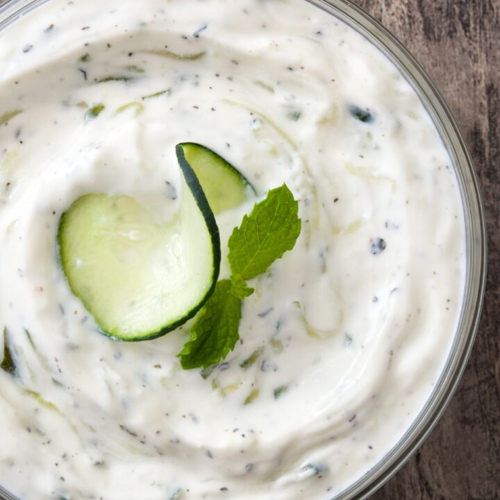 Tzatziki sauce on a white bowl