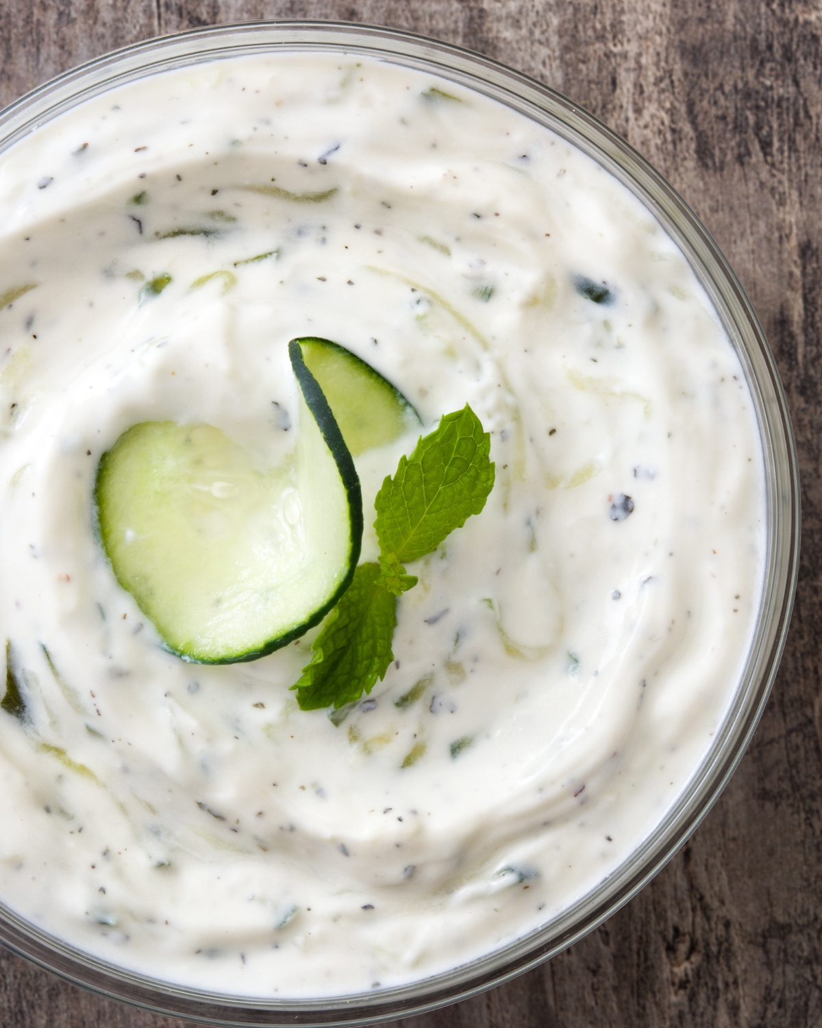 Tzatziki sauce on a white bowl