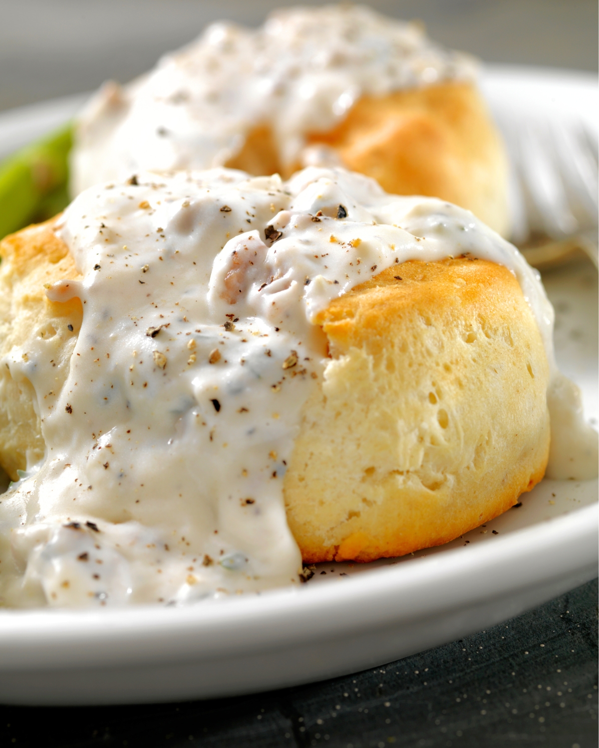 homemade sausage gravy over biscuits