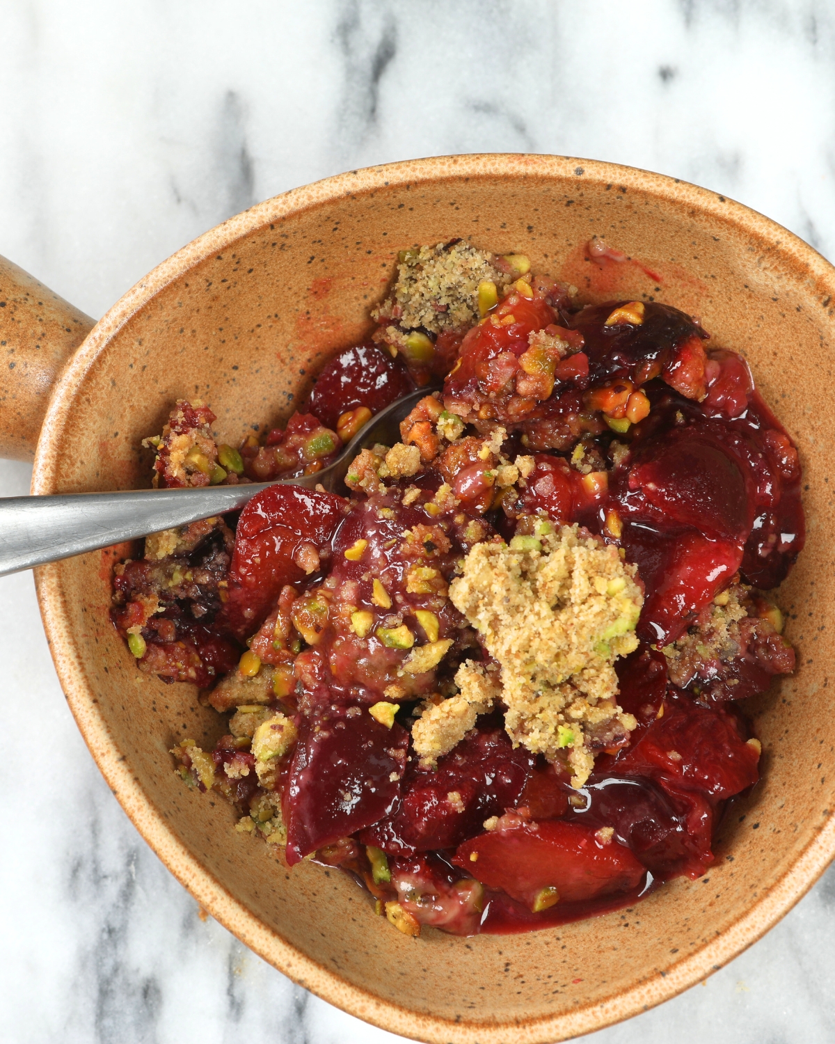 Plum Crisp with Pistachio Oat Crumble