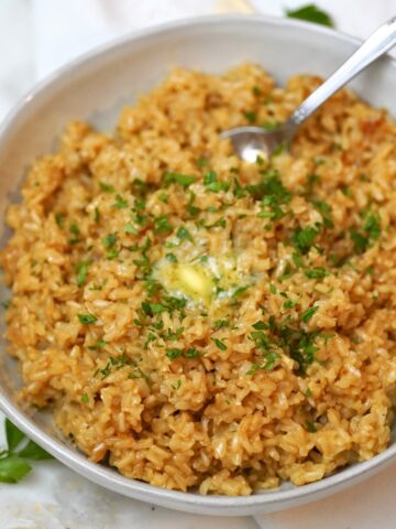 garlic buttered brown rice in a bowl