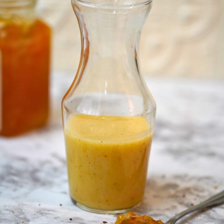 Orange Marmalade Vinaigrette in a glass containes