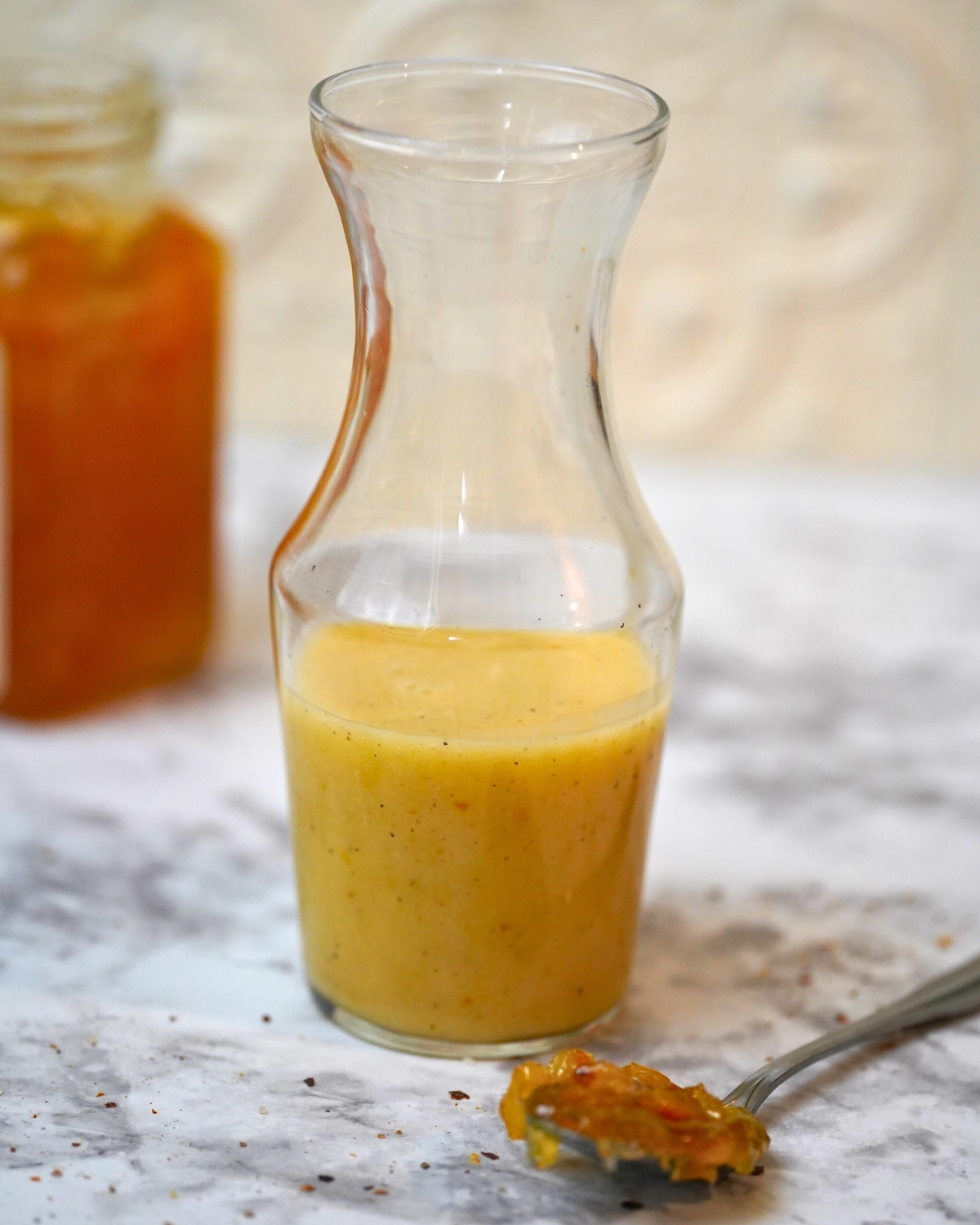 Orange Marmalade Vinaigrette in a glass containes